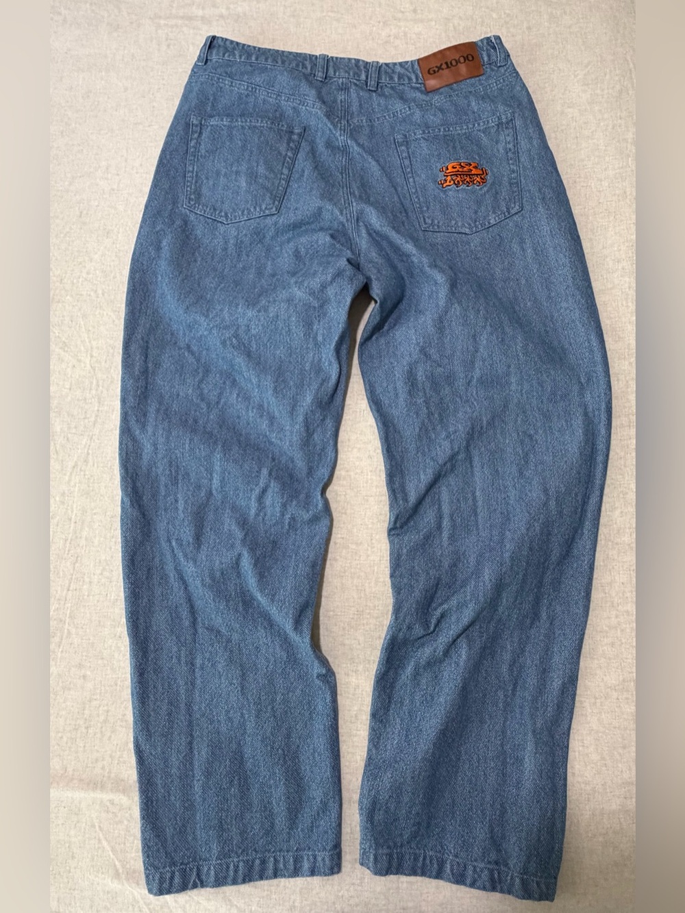GX1000 baggy denim jeans with logo embroidered pocket 38 x 32